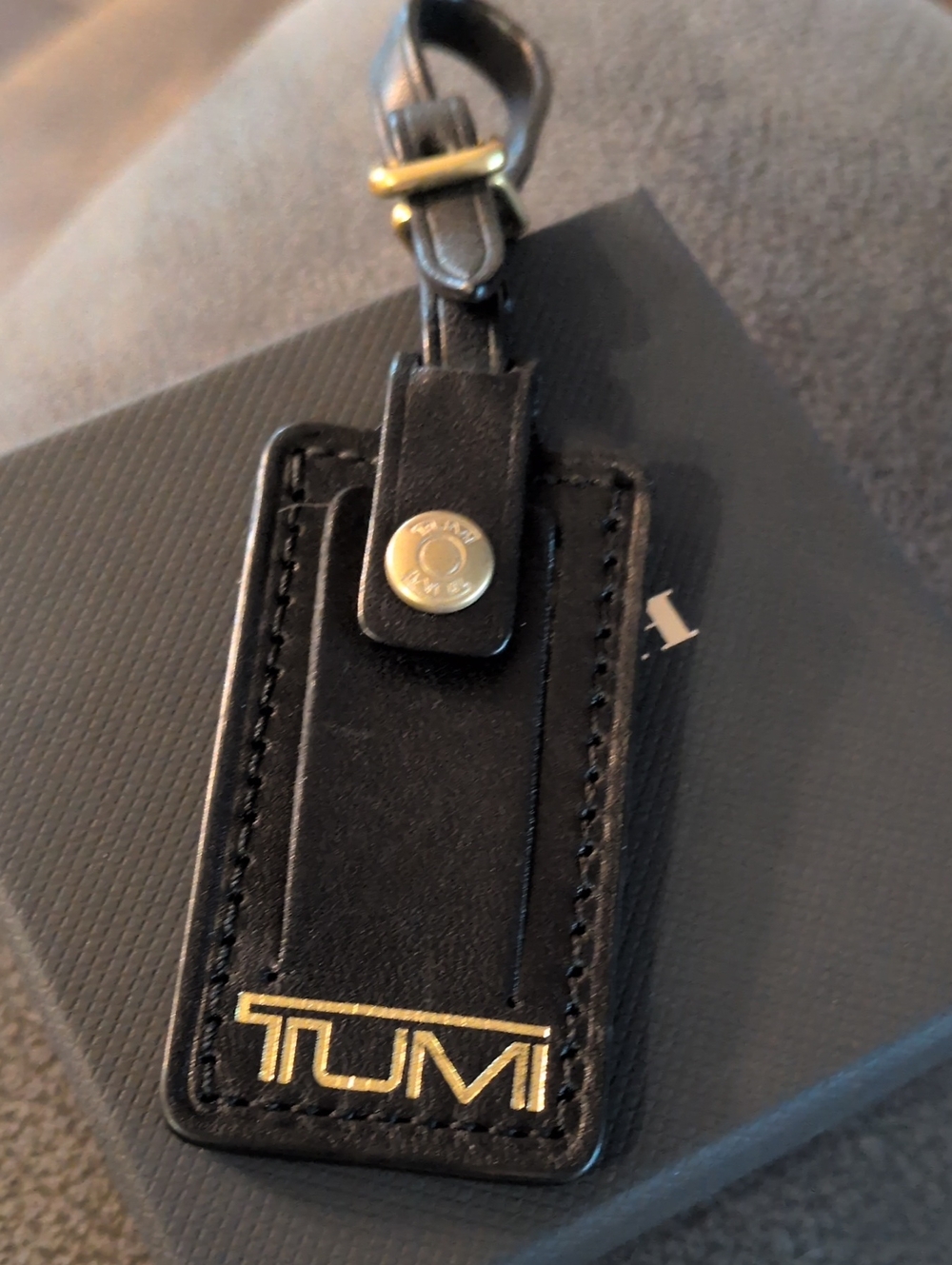Tumi Black Leather Tag with Gold TUMI Logo